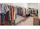 Spacious walk-in closet with custom shelving and plenty of room for clothing storage at 2861 Digna Ct, Acworth, GA 30101