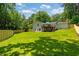 Large, level backyard with a deck and privacy fence, ideal for outdoor enjoyment at 1377 Oak Grove Dr, Decatur, GA 30033
