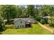 Aerial view of a home with a large, well-manicured lawn and a new stained wood fence at 1377 Oak Grove Dr, Decatur, GA 30033