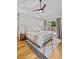Bright bedroom featuring vaulted ceilings, modern ceiling fan, and natural light at 1377 Oak Grove Dr, Decatur, GA 30033