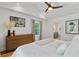 Bedroom featuring vaulted ceilings, natural light, and a stylish dresser at 1377 Oak Grove Dr, Decatur, GA 30033
