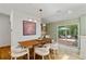 Bright dining area with access to the outdoor deck, perfect for entertaining and enjoying the scenery at 1377 Oak Grove Dr, Decatur, GA 30033