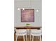 Stylish dining room table setup, featuring a modern chandelier at 1377 Oak Grove Dr, Decatur, GA 30033