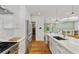 A kitchen that features stainless steel appliances and an adjacent pantry at 1377 Oak Grove Dr, Decatur, GA 30033