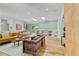 Bright living room featuring hardwood floors, stylish furnishings, and built-in shelving at 1377 Oak Grove Dr, Decatur, GA 30033
