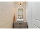 Modern powder room with unique wallpaper, stylish vessel sink, and updated vanity at 1377 Oak Grove Dr, Decatur, GA 30033