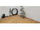 Large room with hardwood floors and base molding, featuring a cat tree and vacuum at 1377 Oak Grove Dr, Decatur, GA 30033