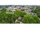 Scenic aerial view of 194 Locust surrounded by lush trees and the town in the distance at 194 Locust Nw St, Marietta, GA 30064