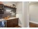 Modern bar area with wine storage, granite countertops and ample cabinet space at 194 Locust Nw St, Marietta, GA 30064