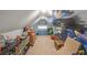 Finished bonus room with unique mural, books, toys, and storage—perfect for ' play area or Gathering fun at 194 Locust Nw St, Marietta, GA 30064