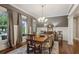 Formal dining room with hardwood floors, decorative chandelier and large windows at 194 Locust Nw St, Marietta, GA 30064