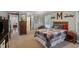 Spacious main bedroom with connecting rooms, including a bedroom and bathroom, and natural light at 194 Locust Nw St, Marietta, GA 30064