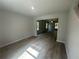 Inviting living room featuring wood-look flooring and ample natural light at 20 Emerald Ln, Covington, GA 30014