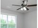 Bedroom featuring a ceiling fan and view from the window at 1955 Nocturne Dr # 3206, Alpharetta, GA 30009