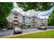 Exterior view of apartment building with parking at 1955 Nocturne Dr # 3206, Alpharetta, GA 30009