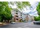 Exterior view of apartment building with parking at 1955 Nocturne Dr # 3206, Alpharetta, GA 30009