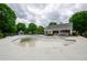 Aerial view of community pool undergoing cleaning and surrounded by lush landscaping at 1955 Nocturne Dr # 3206, Alpharetta, GA 30009