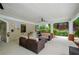 Inviting covered patio area near the pool with comfortable seating at 1955 Nocturne Dr # 3206, Alpharetta, GA 30009