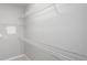 A well-organized walk-in closet with wire shelving at 1955 Nocturne Dr # 3206, Alpharetta, GA 30009