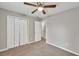 Bedroom features ceiling fan and a closet at 3514 Willgrove Way, Duluth, GA 30096