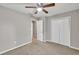 Bedroom featuring carpet, ceiling fan, and closet at 3514 Willgrove Way, Duluth, GA 30096