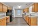 Bright kitchen with stainless steel appliances and granite countertops at 3514 Willgrove Way, Duluth, GA 30096