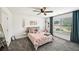 Bright bedroom features a window view, and cozy decorations at 3991 Perry Pass, Lithonia, GA 30038