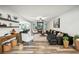 Stylish living room featuring a cozy fireplace, modern decor, and an open layout at 3991 Perry Pass, Lithonia, GA 30038