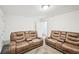 Home theater room is equipped with two rows of reclining seating at 3991 Perry Pass, Lithonia, GA 30038