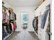 Spacious walk-in closet featuring custom shelving, drawers, and ample storage space at 3991 Perry Pass, Lithonia, GA 30038