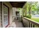 Charming balcony with railings, offering a peaceful outdoor space and view of surrounding greenery at 705 Country Park Se Dr, Smyrna, GA 30080