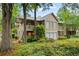 Charming condo features well-maintained landscaping, a private deck, and ample natural light at 705 Country Park Se Dr, Smyrna, GA 30080