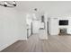 Open floor plan reveals living area adjacent to a fully equipped kitchen at 705 Country Park Se Dr, Smyrna, GA 30080