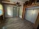 Bedroom with unfinished walls, ceiling fan and wood flooring at 2135 Wells Se Dr, Smyrna, GA 30080