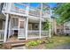 Brick home with a multi-tiered deck offering outdoor living space and beautiful greenery at 2349 Henderson Mill Ne Rd # 2, Atlanta, GA 30345