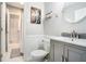 Clean bathroom featuring updated vanity, fixtures, medicine cabinet, and a shower-tub combo at 2349 Henderson Mill Ne Rd # 2, Atlanta, GA 30345