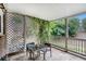 Enclosed patio space offers privacy with wooden lattice, climbing vines, and access to outdoor greenery at 2349 Henderson Mill Ne Rd # 2, Atlanta, GA 30345