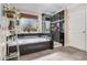 Bathroom features a tub, walk-in shower with black tile, and decorative plants by the window at 2735 Royal Blf, Decatur, GA 30030