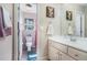 Bright bathroom featuring a single sink vanity and a separate toilet area at 2735 Royal Blf, Decatur, GA 30030