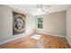 Simple bedroom design with hardwood floors and a neutral color palette at 2735 Royal Blf, Decatur, GA 30030