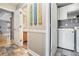 Hallway leading to a laundry room and bathroom at 2735 Royal Blf, Decatur, GA 30030