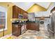 Open kitchen with dark cabinetry and stainless-steel appliances at 2735 Royal Blf, Decatur, GA 30030