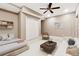 Cozy bedroom with a seating area and neutral decor at 3055 Kennesaw Nw Dr, Kennesaw, GA 30152