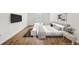 Modern staged bedroom with wood flooring, stylish decor, and ample natural light at 3055 Kennesaw Nw Dr, Kennesaw, GA 30152