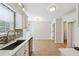 Bright kitchen with stainless steel appliances and a mosaic tile backsplash at 3055 Kennesaw Nw Dr, Kennesaw, GA 30152