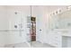 Modern bathroom with tile flooring, walk-in shower, and grab bars at 3082 Monarch Pine Dr, Peachtree Corners, GA 30071