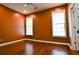 Bedroom with gleaming hardwood floors and large windows providing ample natural light at 3082 Monarch Pine Dr, Peachtree Corners, GA 30071