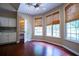 Cozy breakfast nook with hardwood floors and large windows providing natural light at 3082 Monarch Pine Dr, Peachtree Corners, GA 30071