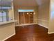 Dining area featuring hardwood floors, a large window, and modern lighting at 3082 Monarch Pine Dr, Peachtree Corners, GA 30071