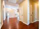 Spacious entryway with hardwood floors leading to the kitchen and living areas at 3082 Monarch Pine Dr, Peachtree Corners, GA 30071